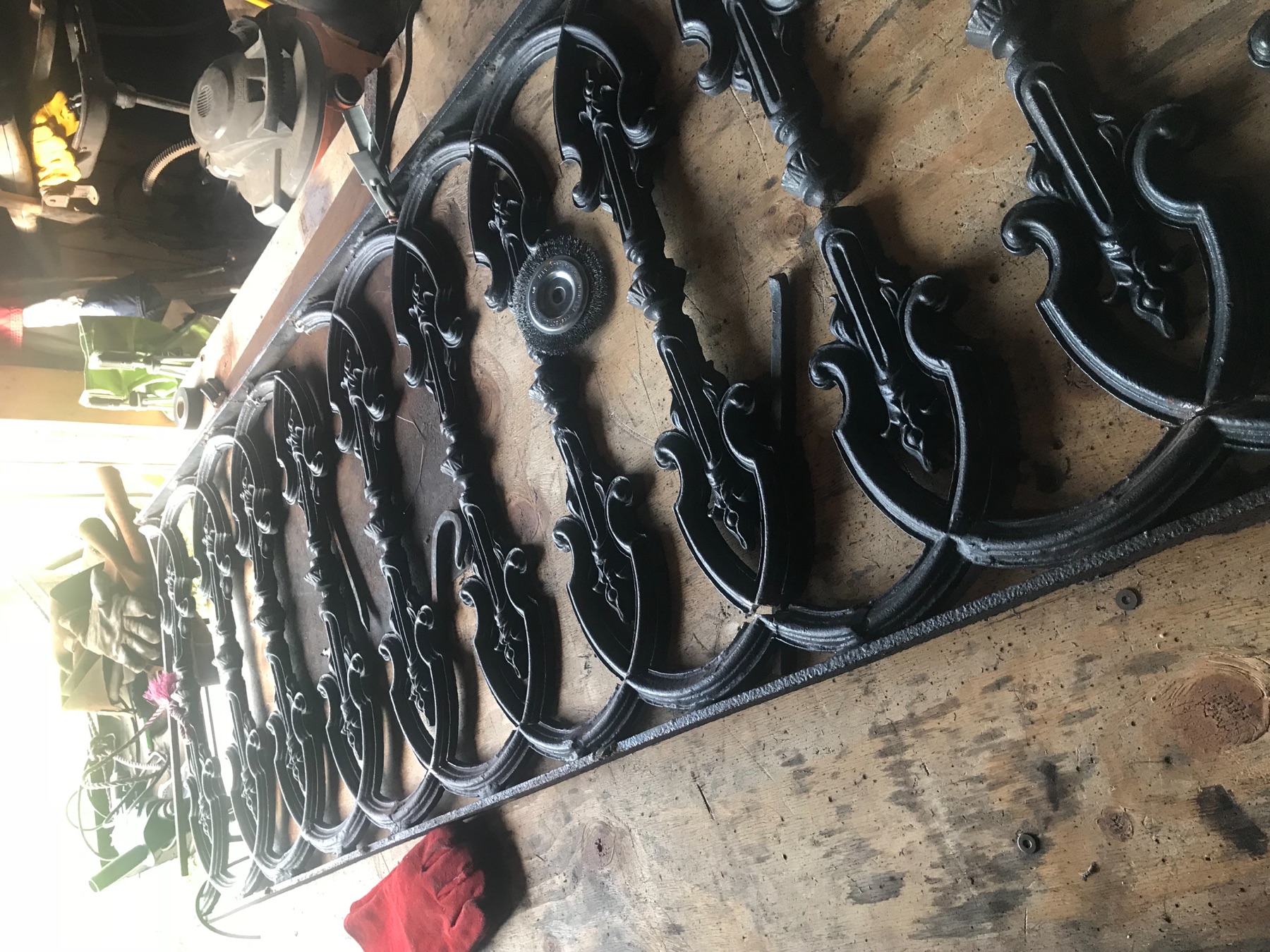 A row of finished decorative iron elements